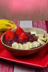 Healthy vegan dessert with banana, avocado and strawberry
