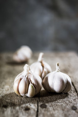 Garlic on the wooden background 