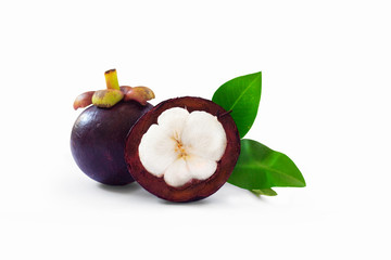 One whole mangosteen and cross section showing the thick purple skin and white flesh isolated on white background with clipping path.