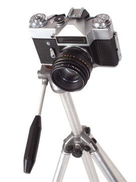 old camera on a tripod