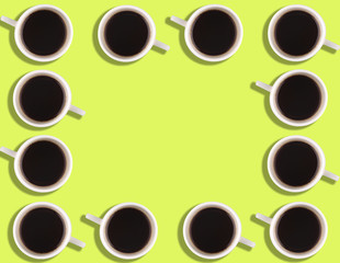 A pattern of small coffee cups on a bright colored background with copyspace
