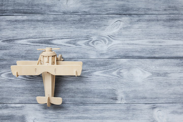 top view of a wooden toy airplane