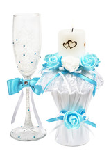 decorated wedding cob and burning candle isolated on white background