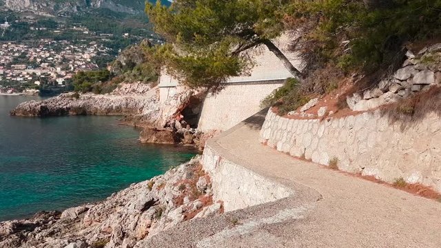 POV Shot Of Walking On The Path By The Mediterranean Sea in Roquebrune-Cap-Martin On The Cote d'Azur, France, Europe - 4K Video