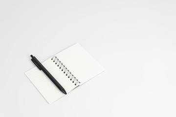 Stationery set such as Note books and Pens on white background.