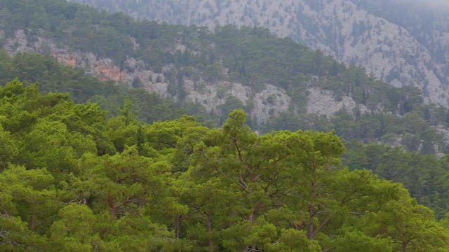 Beautiful cloudy scenic landscape. Taurus mountains in Turkey, Beldibi town area situated between Kemer and Antalya turkish cities. Camera moving from left to right.