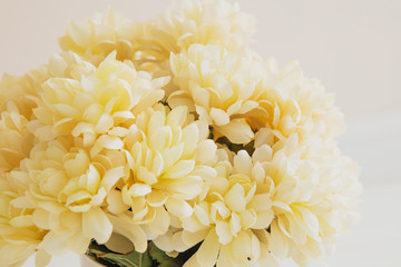 A bouquet of artificial beige flowers for the wedding decoration