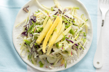 Mango, mangetout, cabbage & coriander salad with lime & ginger dressing