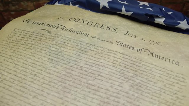 American declaration of independence with star spangled flag