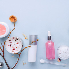 Organic bio cosmetics with herbal ingredients. Natural extract of rose, oils, serum. Copy Space, flat lay, Handmade