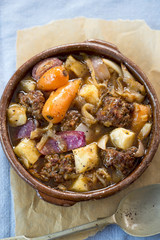 Meatballs with vegetables in gravy