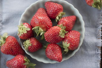 Strawberries in blue bowl 