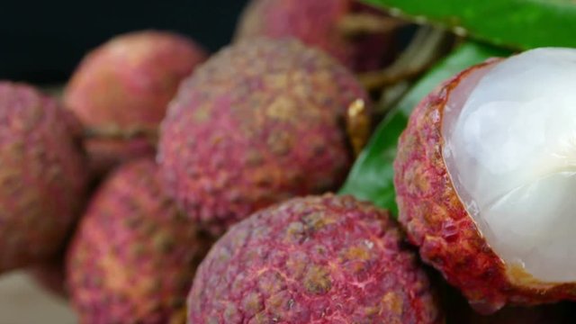 4k Close up ,dolly shot of red exotic Chinese lychee fruits 
