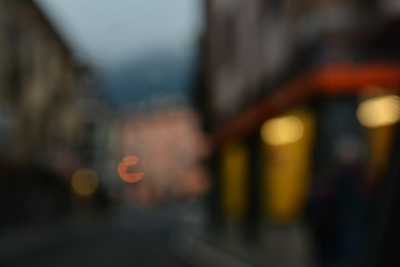 Blurred abstract background. Travelling in Italy in a rainy summer night.