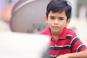      Portrait of Indian Little boy Posing to Camera with Expression 