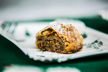 Traditional fresh apple cake with sugar.close-up.