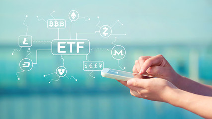 Cryptocurrency ETF Theme with person holding a smartphone in front of modern building