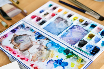 art painting inspiration creativity concept. mixed ink colors. watercolor palette. artist imagination