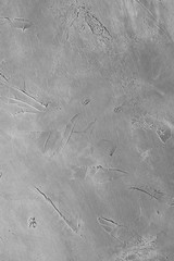 abstract art grey textured dust background. distressed light scratched stucco design. free space concept