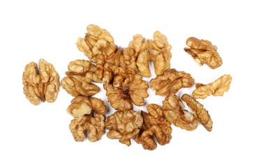 Walnut kernels, pile isolated on white background, top view
