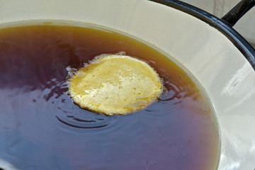 Brazilian street food: acaraje in the frying pan