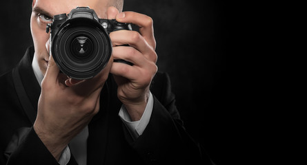 Photographer with camera.