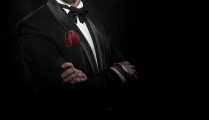 Obraz na płótnie Canvas Young handsome man in black suit.