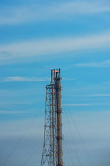 Industrial chimney, which emits smoke into the air.