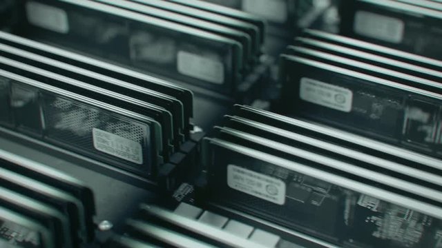 Many Ram memory installed in rows. Loopable shot od computer data storage.