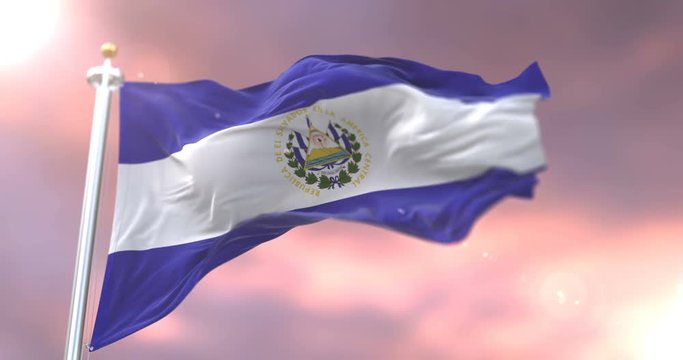 Flag of El Salvador waving at wind at sunset, loop