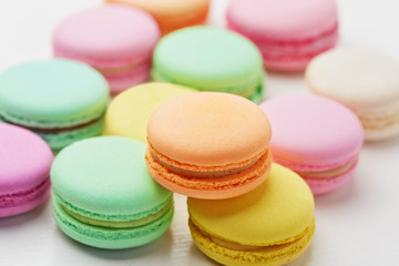 Fototapeta na wymiar Macarons. Colorful French Macaroons Close Up