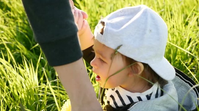 Mom Helps Son To Get Off The Ground