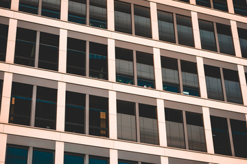 square formed office facade with darken windows