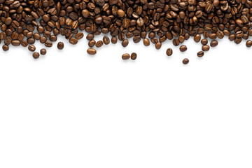 Roasted coffee seeds on white background. top view with space for text