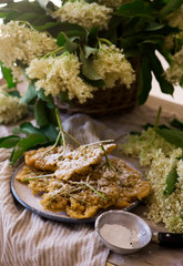 elderflower blossoms deep-fried..style vintage