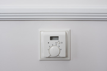 White light switch, turn on or turn off the lights. Regulator of electric switch of candle-power.
