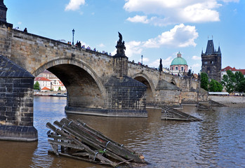 View from the Vltava River to Charles Bridge, the Old Town Tower and the Church of St. Francis of Assisi.City Prague, Czech Republic, Europe, UNESCO.