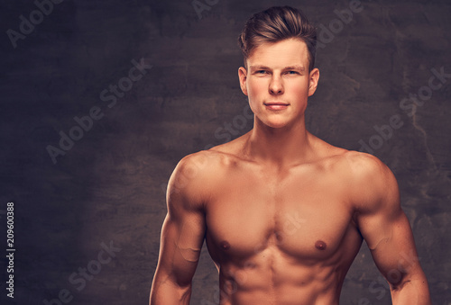 Close Up Portrait Of A Sexy Shirtless Young Man Model With A