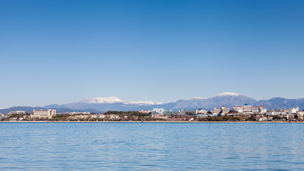 Naklejka premium Side West Beach. The view towards the west beach of Side taken from the peninsula of the ancient Greek city of Side in southern Turkey.