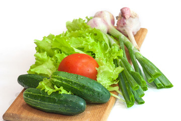 a fresh group of vegetables on white background.