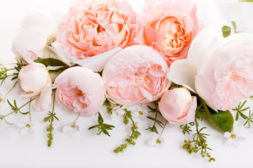 Festive flowers English rose composition on the white background. Overhead top view, flat lay. Copy space. Birthday, Mother's, Valentines, Women's, Wedding Day concept