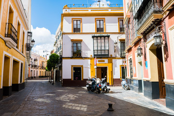Fototapeta premium colorful street of seville old town, spain