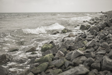 turquoise waves of a raging ocean on the summer beach
