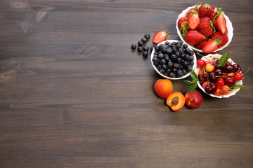 fruit on a dark wooden table