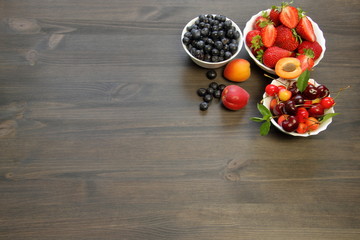 fruit on a dark wooden table