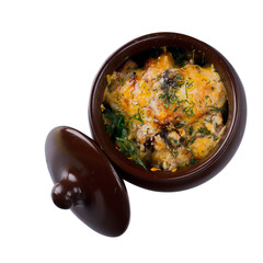 Mushrooms with cheese in a pot on a white background