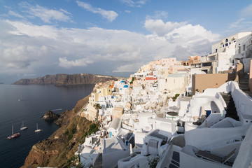 Fototapeta na wymiar Iconic panoramic view over Oia village on Santorini island, Greece