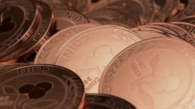 A big pile of generic, fake coins in copper colour. Seamlessly looping shot.