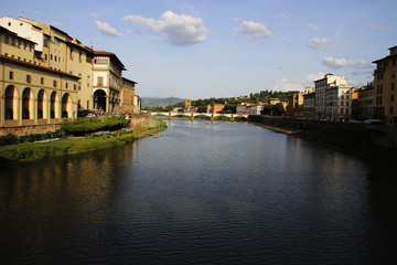 Fototapeta na wymiar View from medieval stone bridge Ponte Vecchio- Arno River
