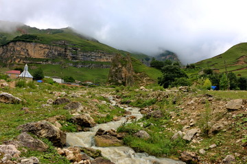 Fototapeta na wymiar mountain landscape with a small river